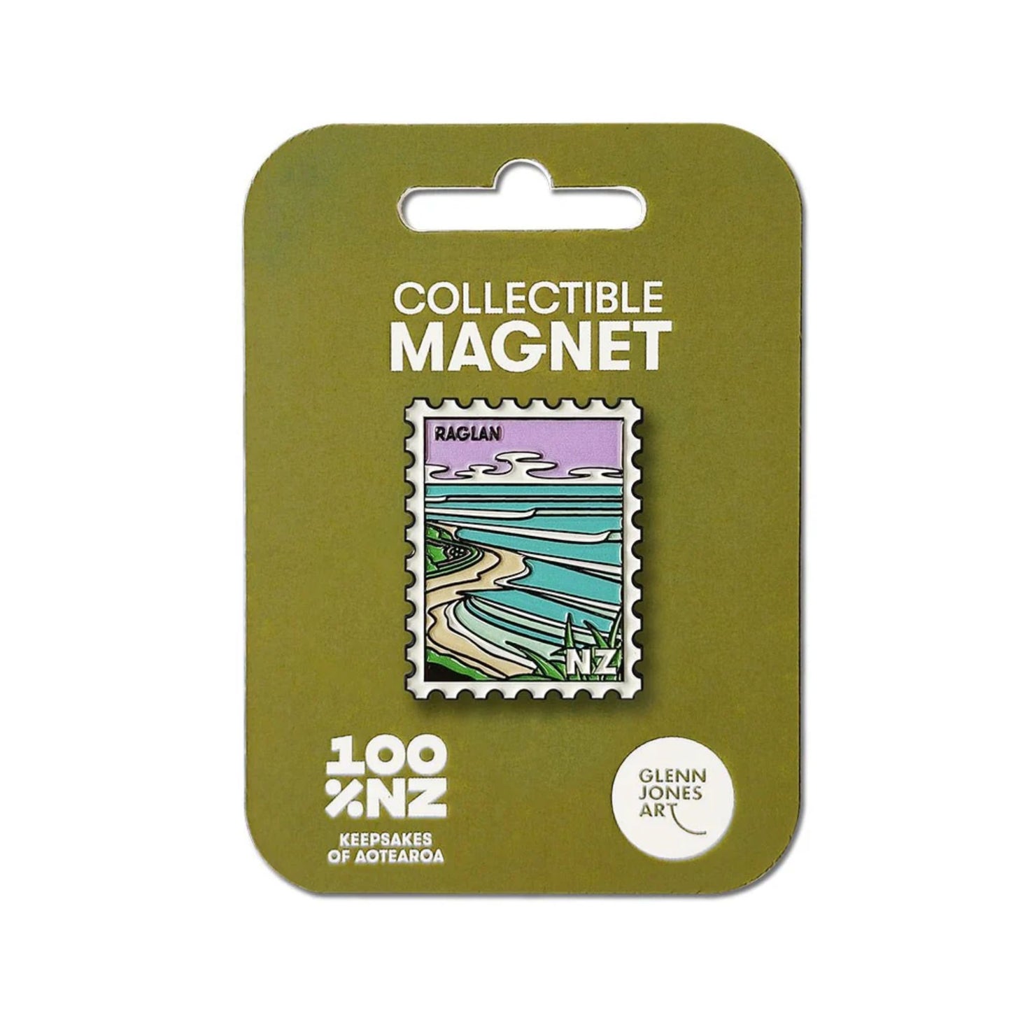 Enamel magnet with a design of a coastal scene and 'Raglan' text on a paper on a white background