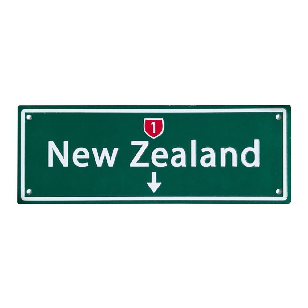 Green sign with 'New Zealand' text on a white background