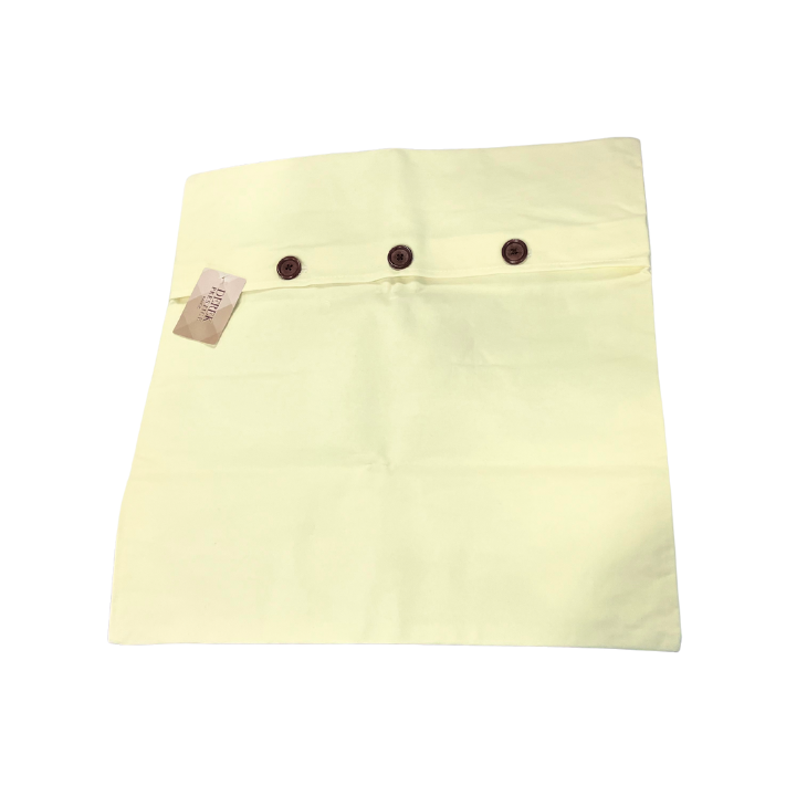 Light yellow skirt with two buttons on a white background