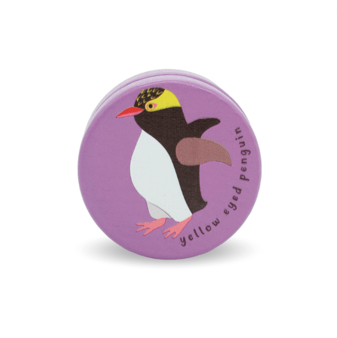 Purple yoyo with an image of a yellow eyed penguin