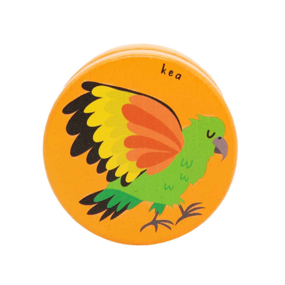 Round yoyo with a colorful kea illustration on an orange background