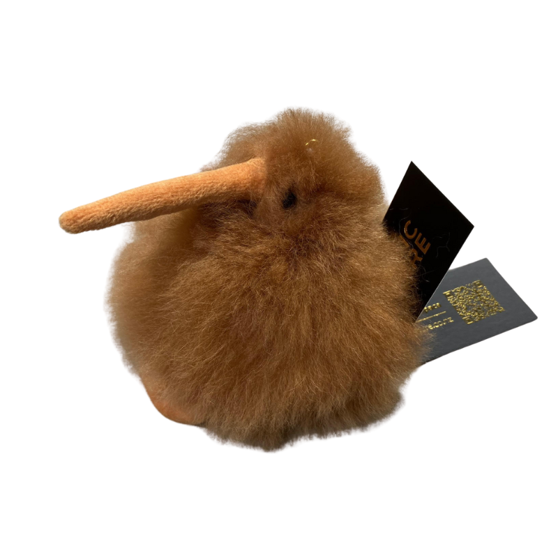 A brown kiwi key ring made with Alpaca hair on a white background
