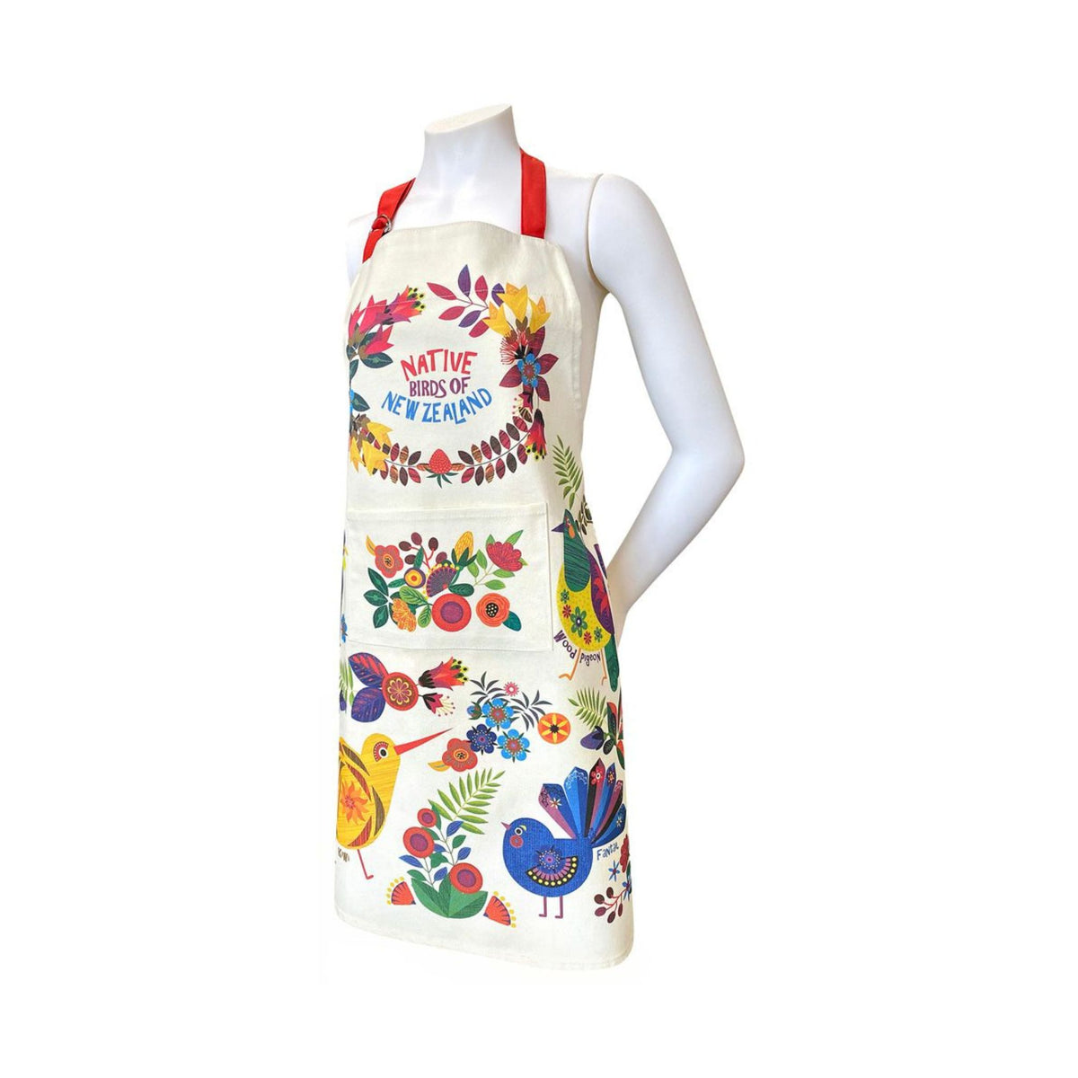 A cream-colored apron with a vibrant, colorful Native Horses of New Zealand print, displayed on a white mannequin torso against a plain white background.