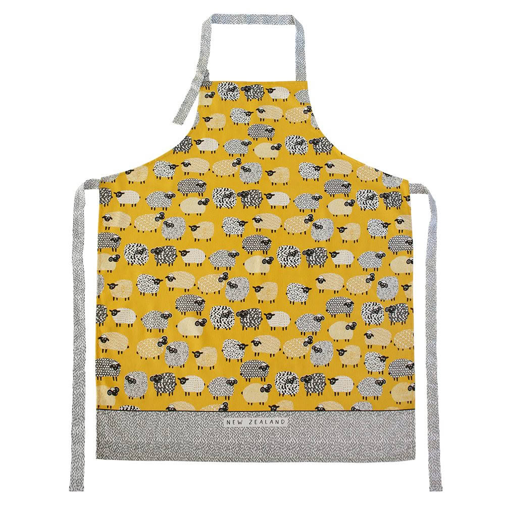 Yellow apron with counting sheep pattern on a white background