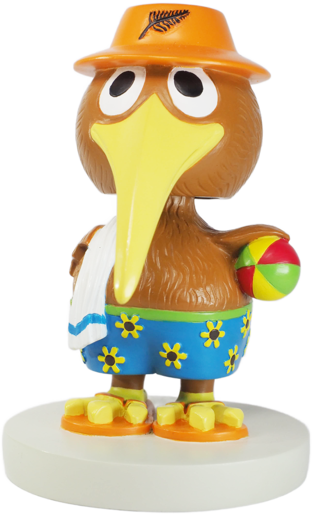 Cartoon-like kiwibird figurine wearing a hat and shorts, holding a beach ball, on a white background