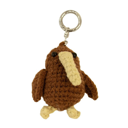 Brown and beige crochet kiwi keychain on a white background