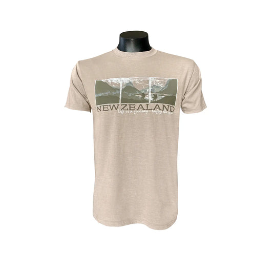 Beige t-shirt with New Zealand graphic and logo of life is a journey on a mannequin against a white background