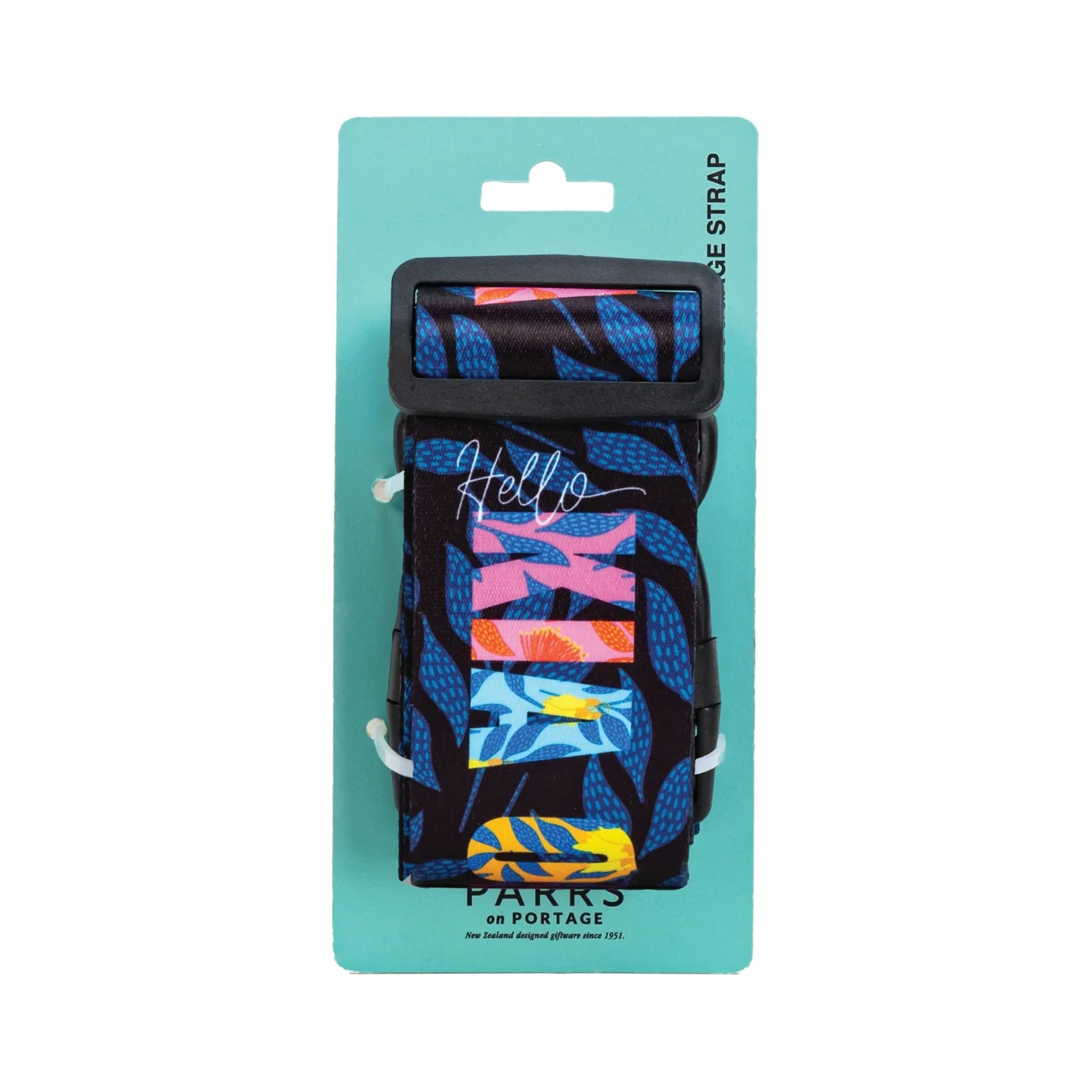 Luggage Strap – Kia Ora Florals. Colorful strap with floral pattern on a blue packaging card