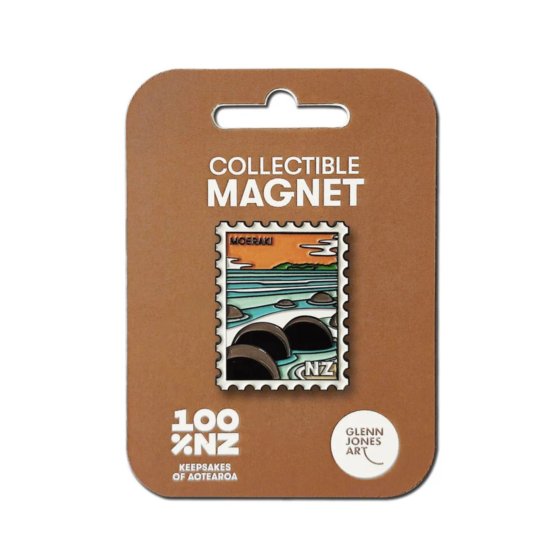 Collectible magnet with a design of a wave and mountains on a brown backing card.