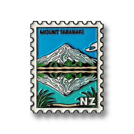 Magnet with Mount Taranaki design on a blue background