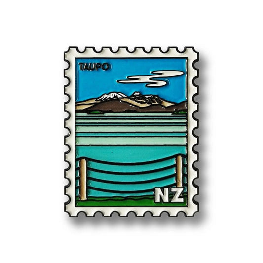 Enamel magnet with a design of Taupo, New Zealand, on a white background