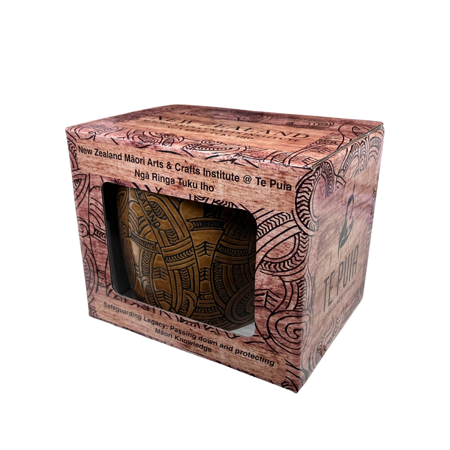 Whakairo Mug in a decorative box with Maori patterns, displayed on a white background.