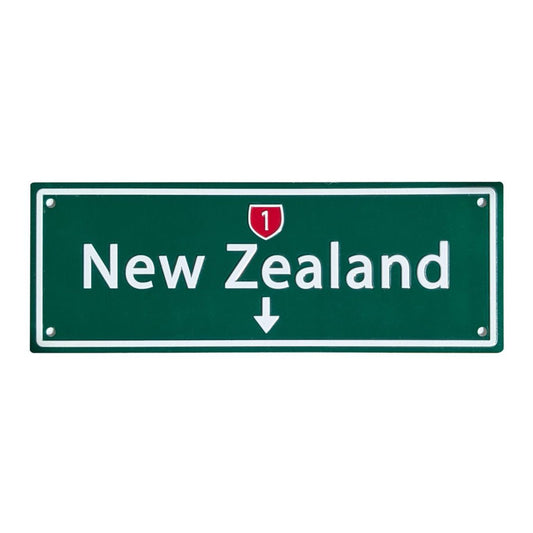 Green sign with 'New Zealand' text on a white background
