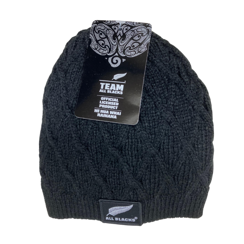 Black knit beanie with All Blacks logo on a white background