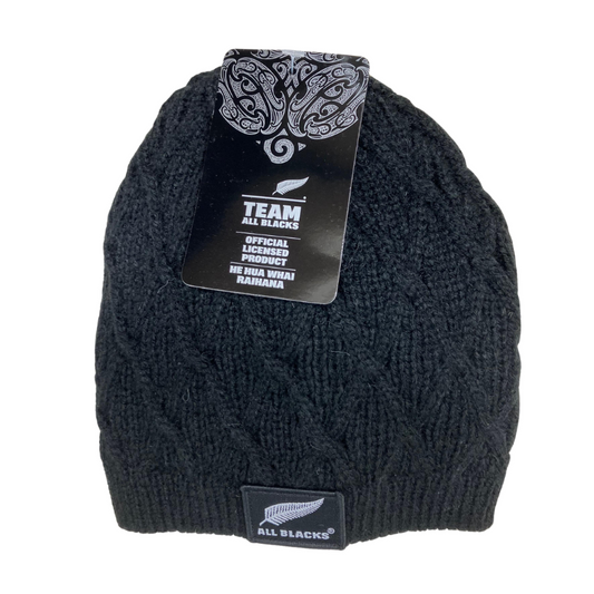 Black knit beanie with All Blacks logo on a white background
