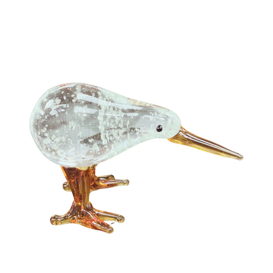 Glass Kiwi Glow in the Dark figurine with a clear body and gold legs on a white background