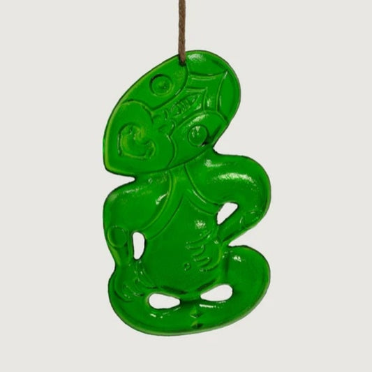 Ornament-Glass-Tiki-Green-6.5x10.5cm-Small. Green decorative item with intricate design on a white background