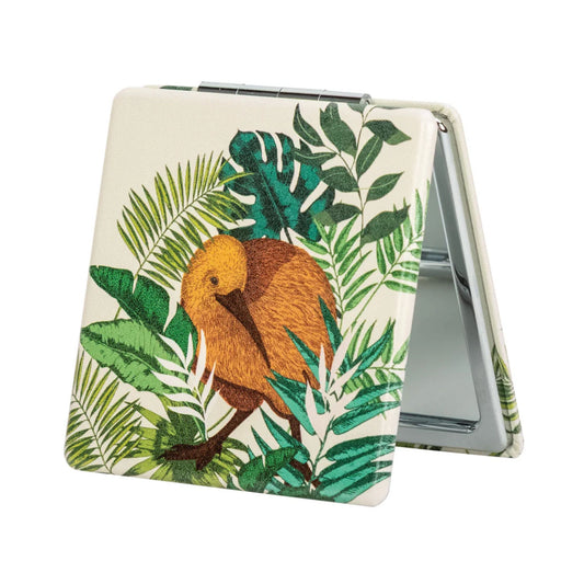 Pocket Mirror Kiwi Tropics Cream. Small notebook with a sloth and leaf design on a white background