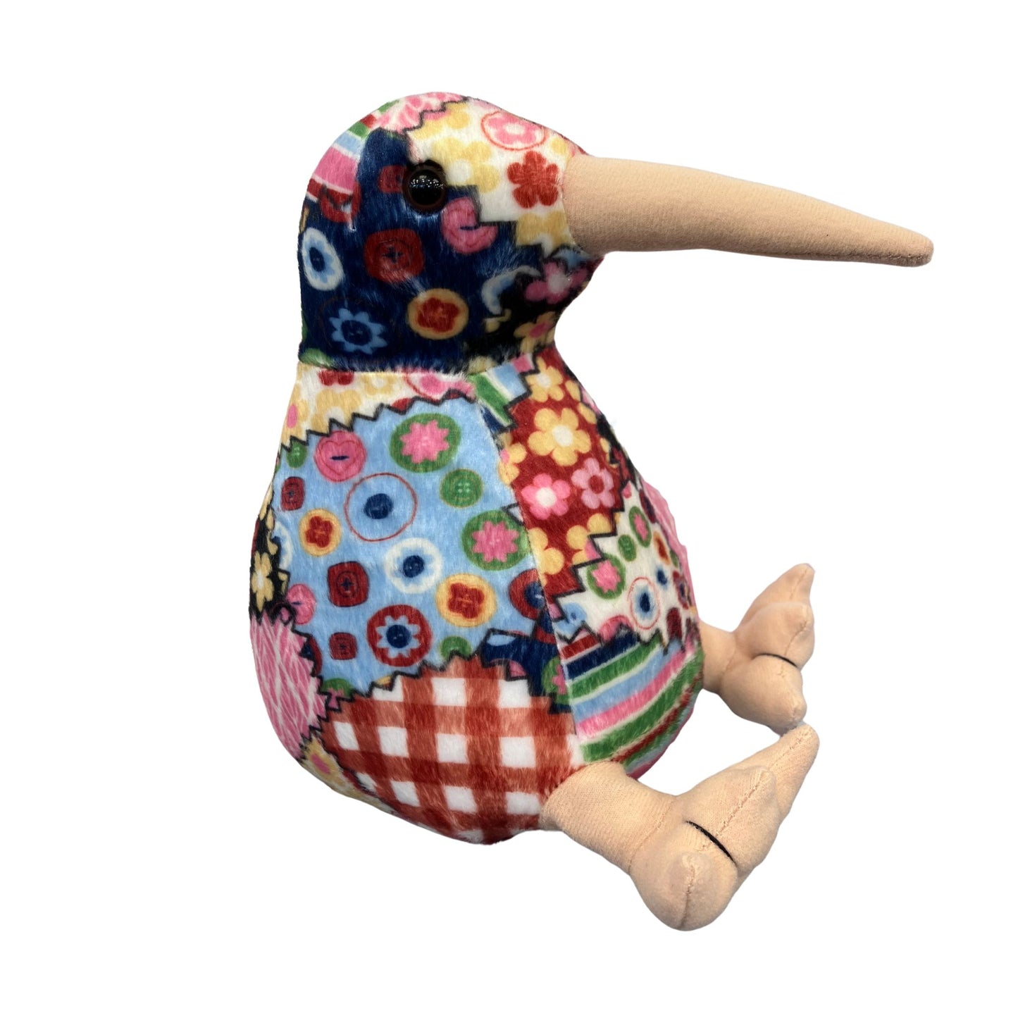 Colorful quilted floral-patterned kiwi plush toy resembling a kiwi bird on a white background