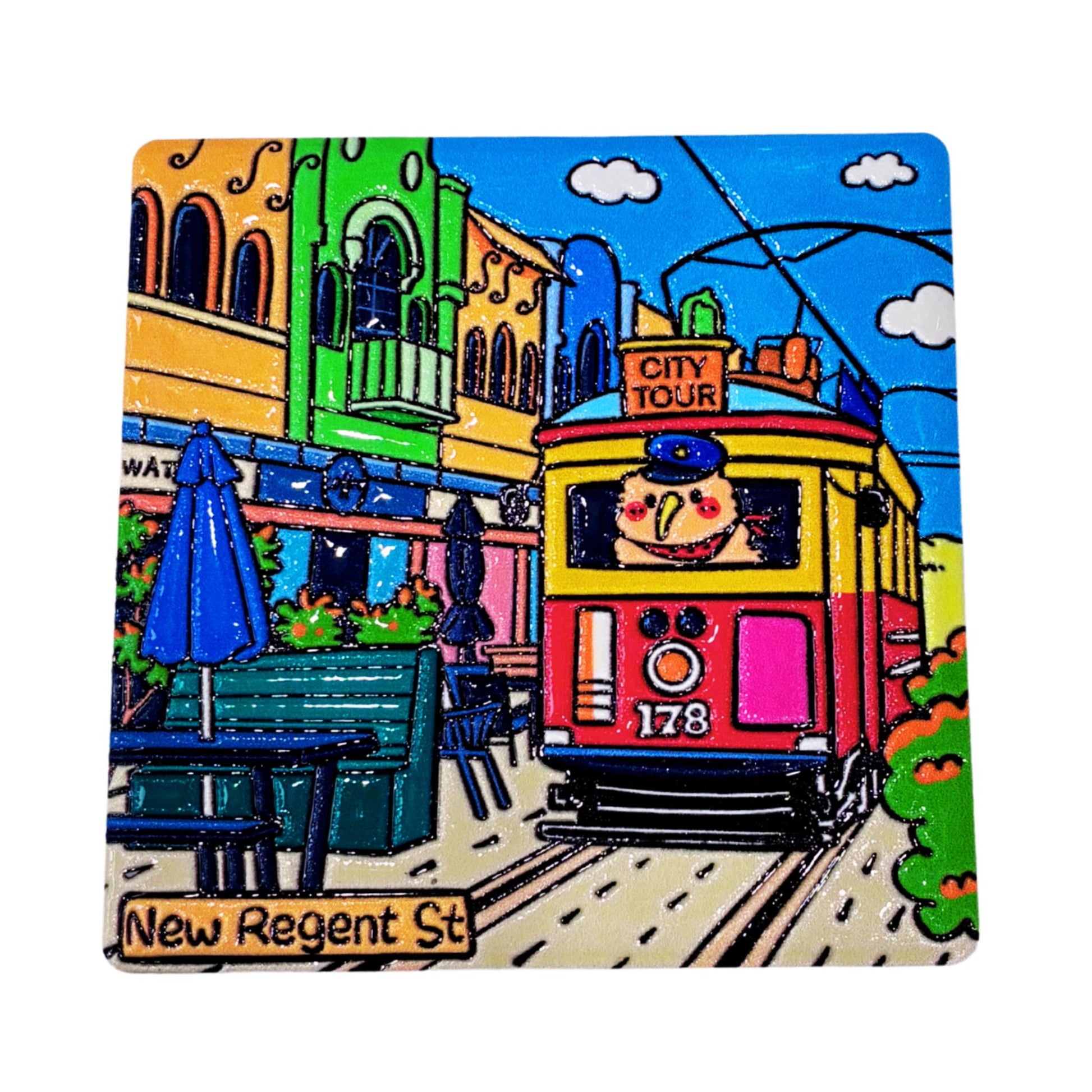 A square ceramic coaster featuring a colorful, hand-drawn style illustration of a New Regent Street scene with a red and yellow city tram, colorful buildings, and a blue sky.