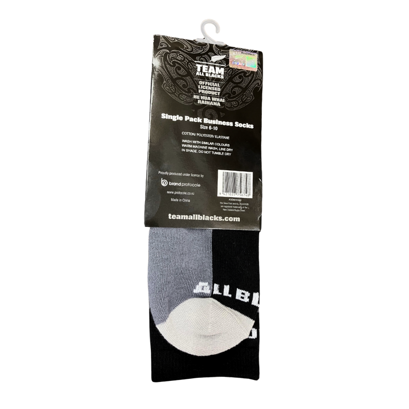 Packaged gray and black sock with brand label on a white background