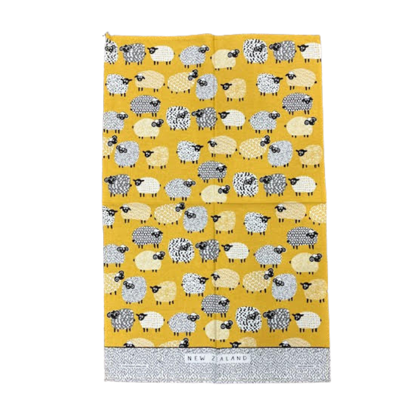 Tea towel with sheep pattern on a yellow background