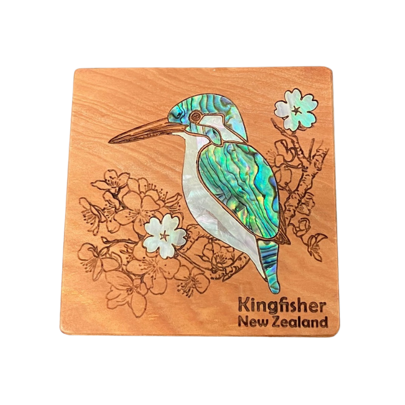Wooden magnet with a Kingfisher design and floral elements on a white background