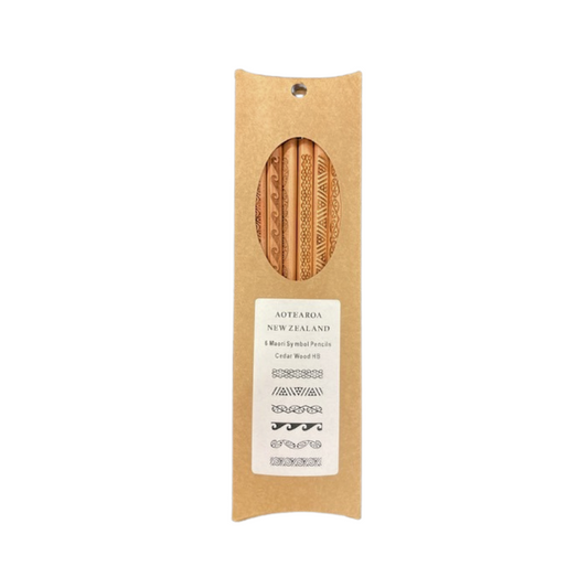 A pack of six cedar wood pencils with Maori tribal designs, packaged in a cardboard sleeve labeled 'Aotearoa - New Zealand'