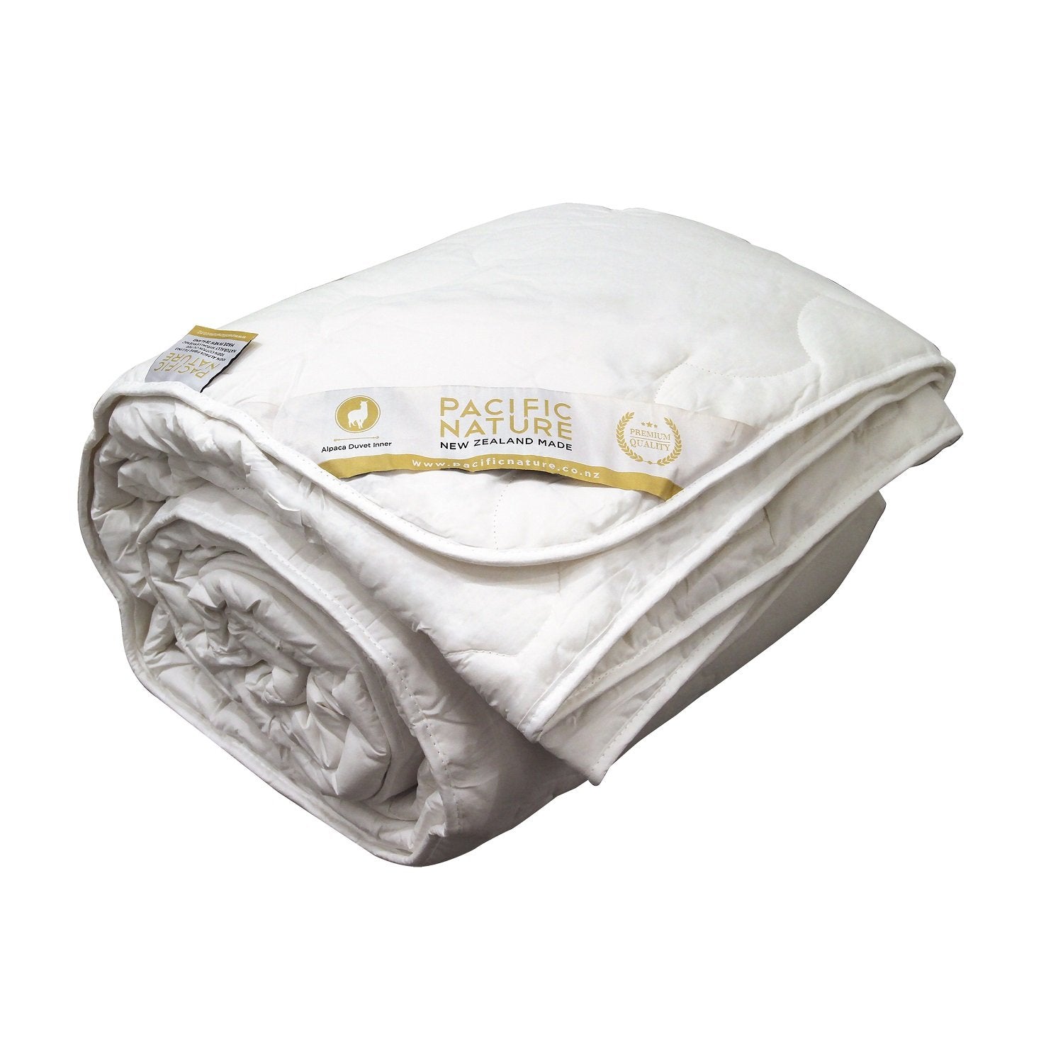 A beige Pacific Nature alpaca duvet cover displaying the brand's logo and information.