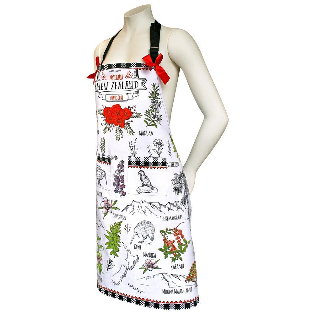 Apron with New Zealand's flowers, birds, and landscape.
