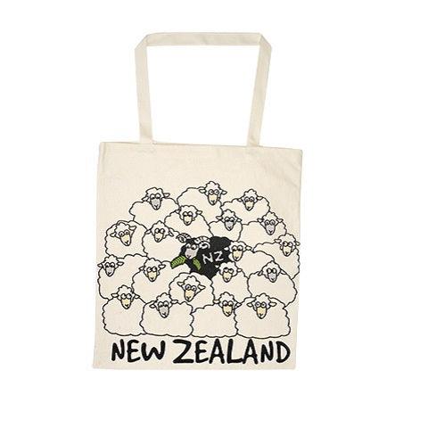 Toat bag with an image of nineteen white sheep and one black sheep with the word New Zealand written on.