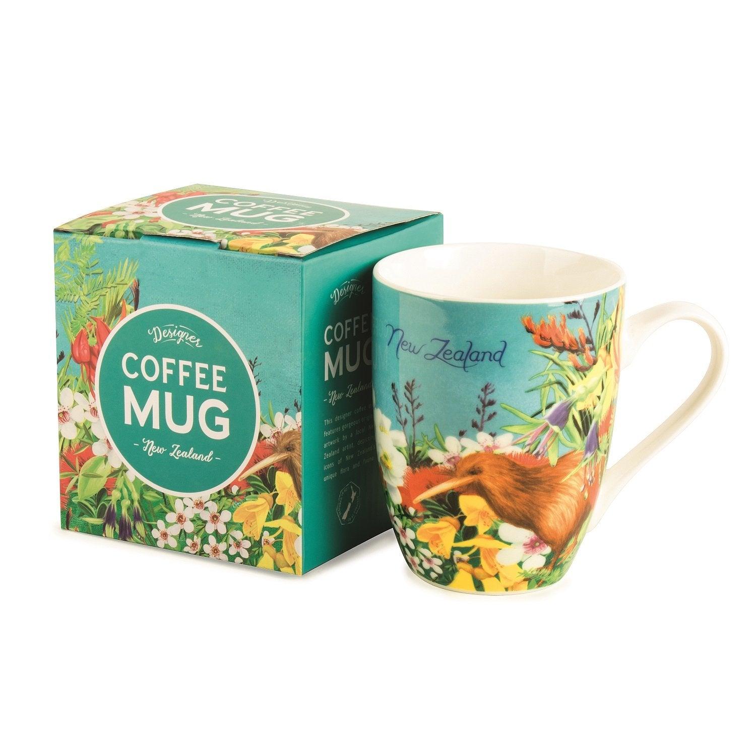 Coffee mug with New Zealand garden and a kiwi bird image next to box.